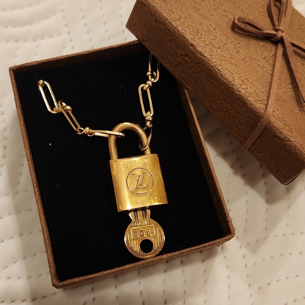 AUTHENTIC LOUIS VUITTON Vintage Lock and Key on a Gold Plated Chain Neck…